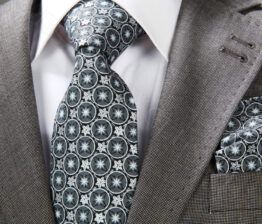 pack corbata, pañuelo y gemelos gris con circulos